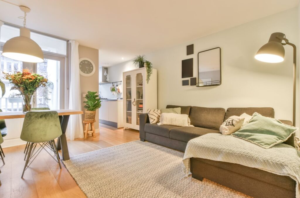 A Sunshine Cleaners team member providing expert house cleaning services in Hyde Park, FL, showcasing professional tools and dedication to quality.