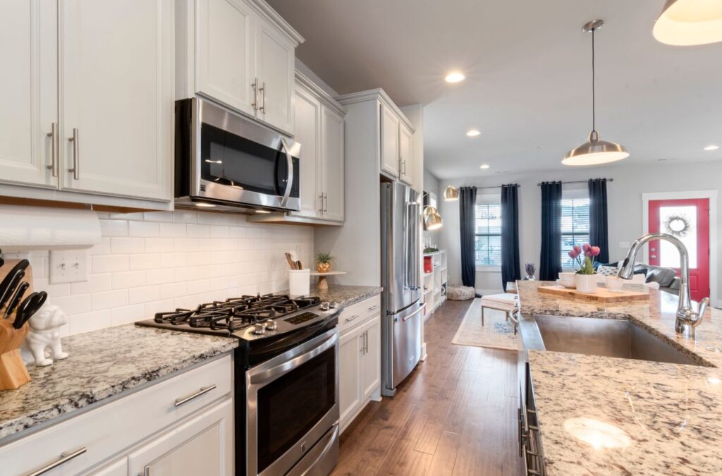 A Sunshine Cleaners team member providing house cleaning services in South Tampa, FL, using professional tools to deliver spotless results.